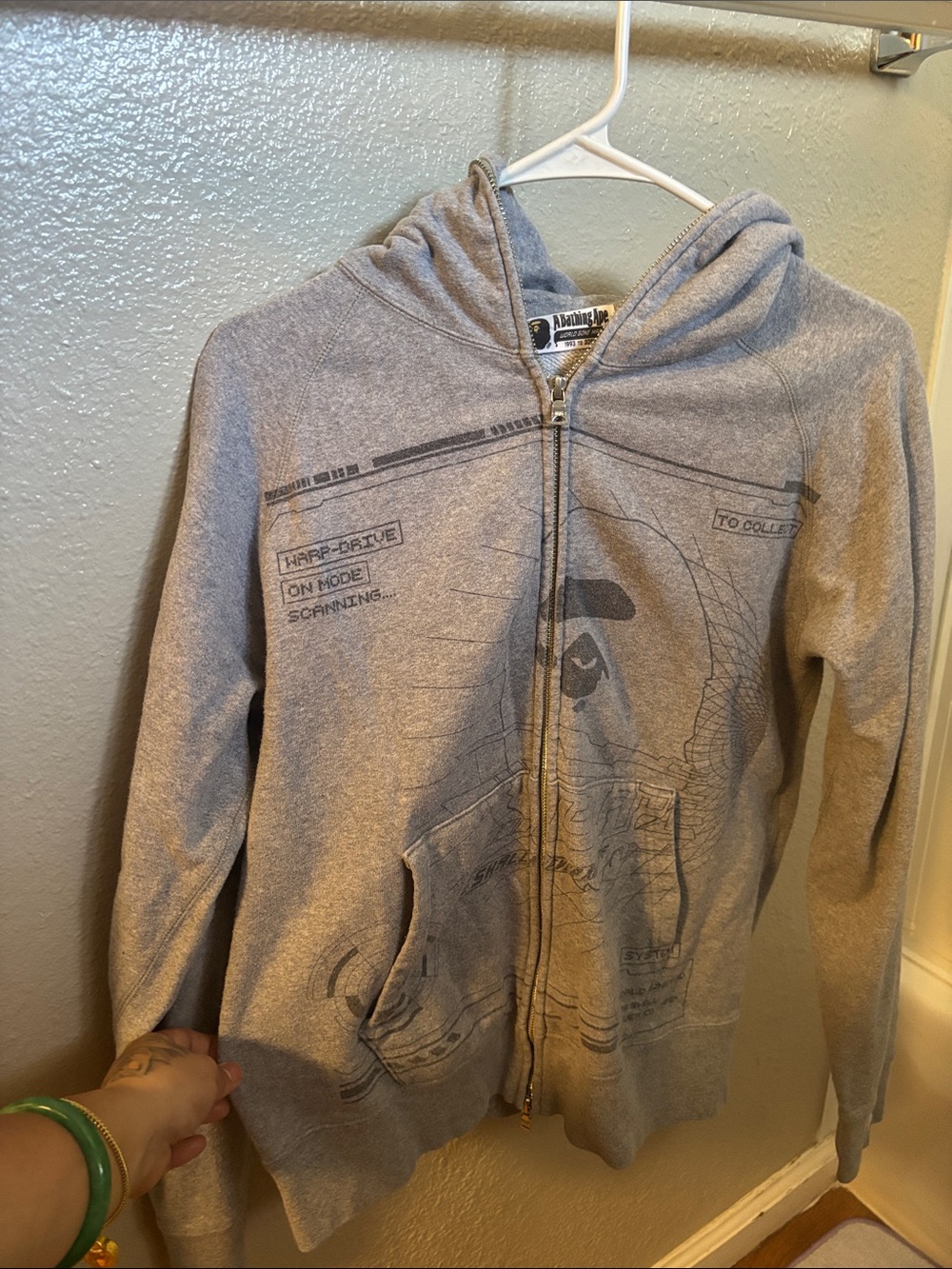Bape Men's Light Gray Zip-Up Hoodie with Subtle Graphic